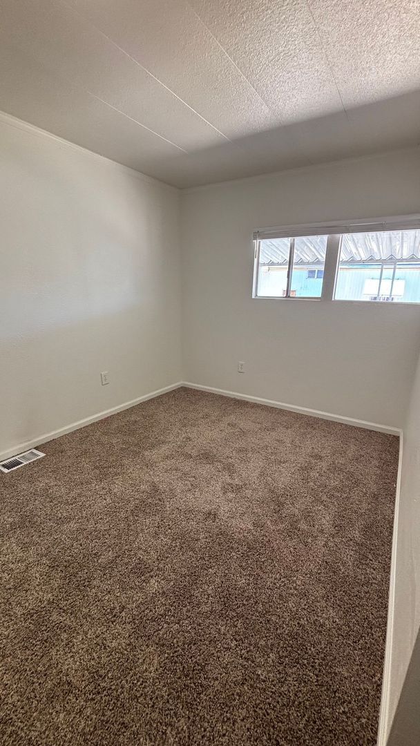 Building Photo - Updated 3 bedroom, 2 bathroom mobile!