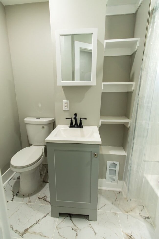 Building Photo - Spacious 3-Bedroom Single-Family Row Home ...