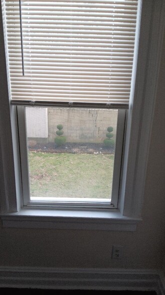 Back bedroom with view of back yard - 104 N Munn Ave