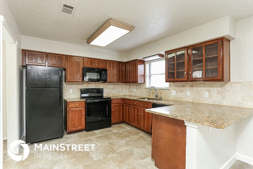 Building Photo - 8913 Doliver Dr