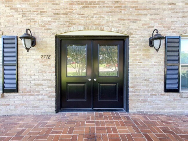 French door. The front door of our building. - 7718 Royal Ln