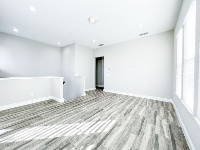 Building Photo - Luxury 4-Bedroom Townhome in Laureate Park – Now Available!