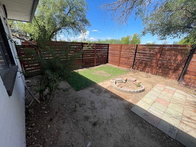 Building Photo - OPEN HOUSE! Remodeled Two Bedroom, End Unit with A/C and Large Fenced Yard