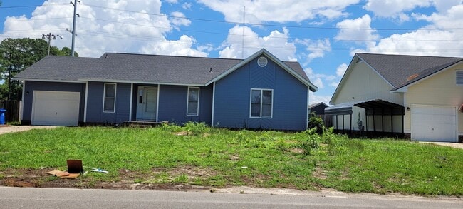 Building Photo - Clean 3 bedrooms, 2 baths, single garage w/remote control, and fenced yard!!