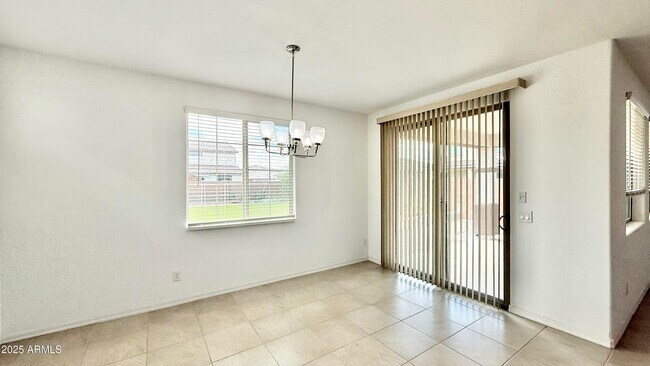 Building Photo - 10935 E Tesla Ave