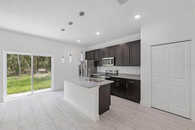 Building Photo - 10089 N Athenia Dr