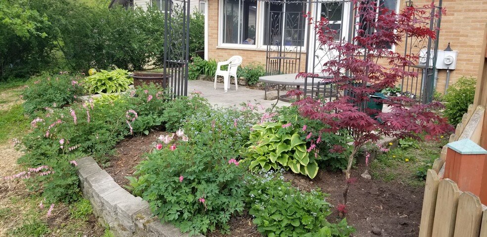 Landscaped back porch - 135 Ridge Ct