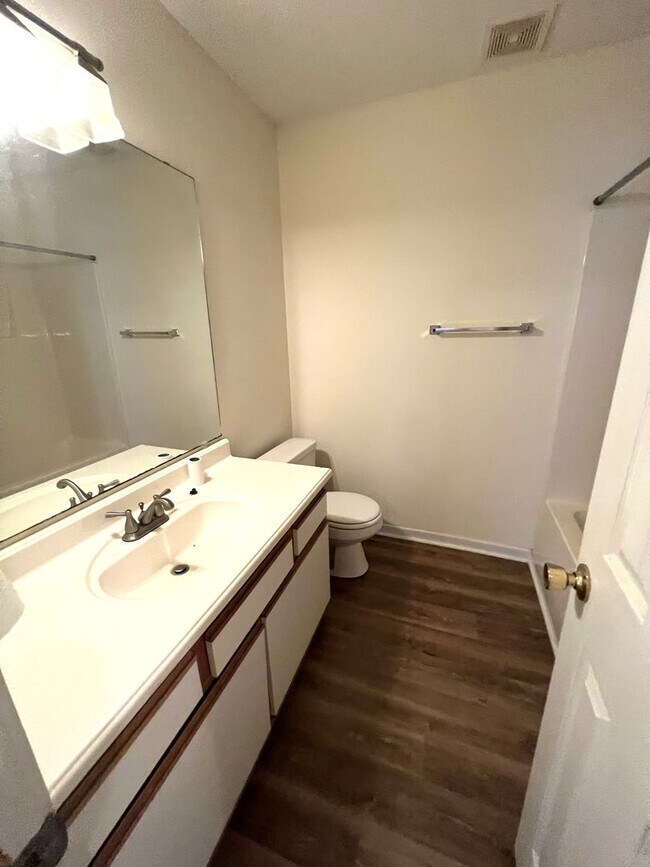 Building Photo - Updated flooring, McClelland Town homes 2BR/2Bath one level patio home, with back court yard! Clo...