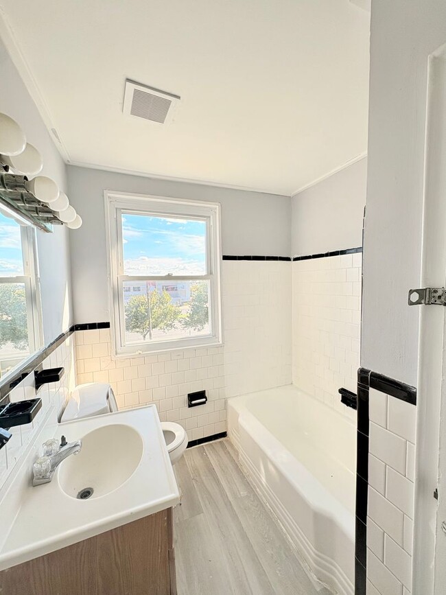 Building Photo - Charming Brick Home with Finished Basement...