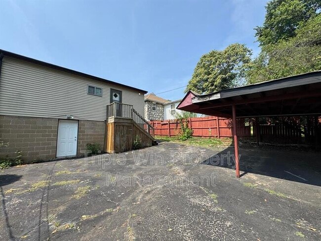 Building Photo - 6905 Woodrow Ave