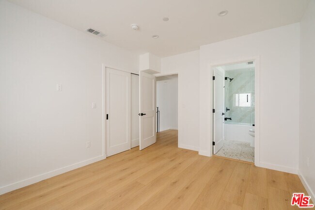 Building Photo - 1201 N McCadden Pl