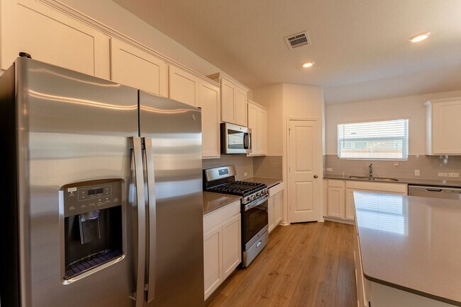 Building Photo - Modern Elegance in Kyle: 3BR Home with Office, Double Vanity, and Stylish Kitchen Island