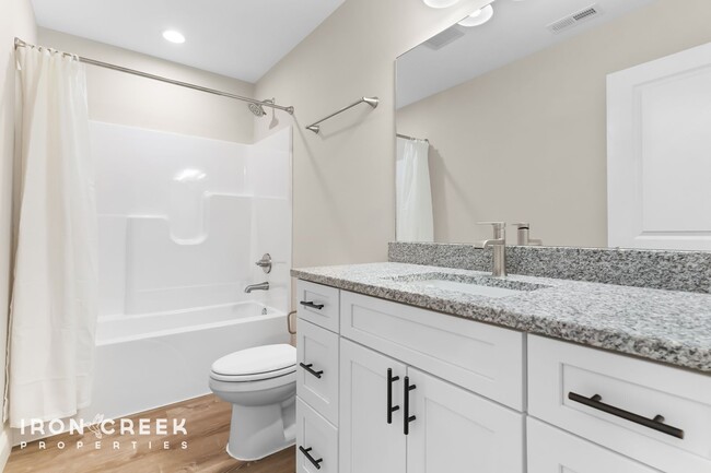 Building Photo - Bright and Modern: New Construction Three-...