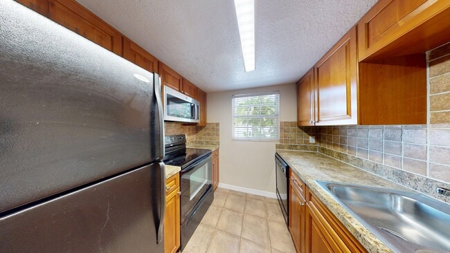 Building Photo - 2Bed/1.5Bath TOWNHOUSE IN WINTER PARK!!   ...