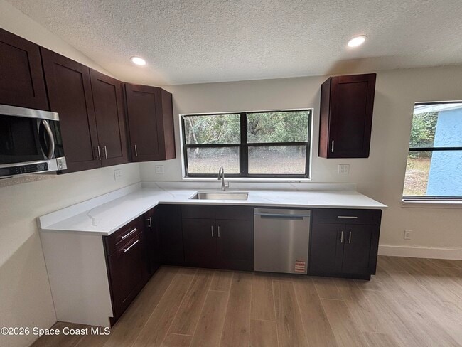 Building Photo - 6335 S Tropical Trail