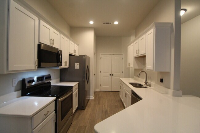 Building Photo - Sweetbarb Estates 3BR Home Near I-10 & Pine Forest Rd with Quartz Kitchen, Tile Floors, 2-Car Gar...