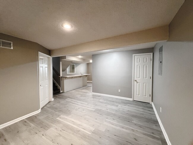 Building Photo - SEE IT NOW: Spacious 3-Bedroom Smart Home ...