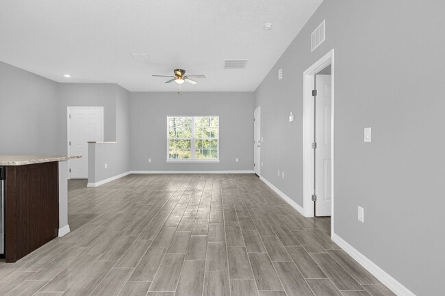 Building Photo - Discover the 3 BD/2BA Home in Beautiful Palm Bay!! Alexa Enabled SMART HOME!