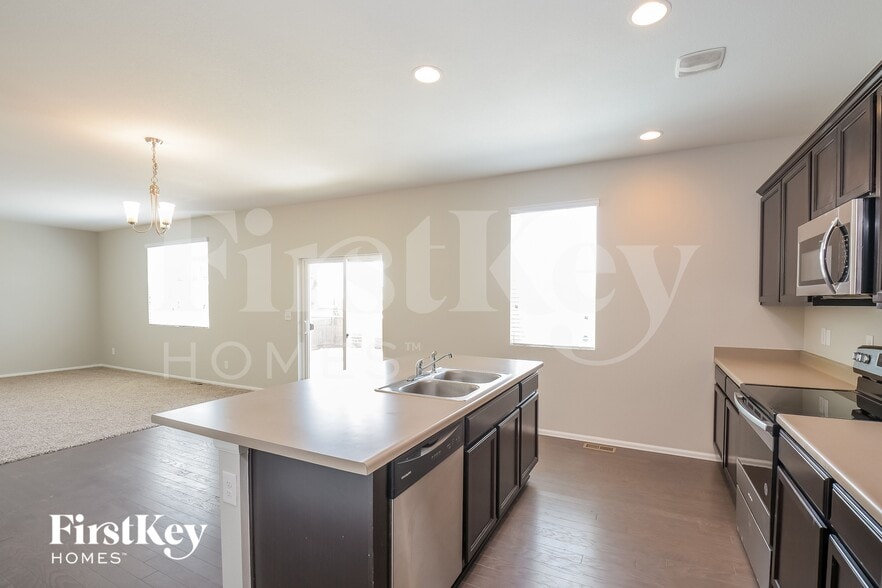 Building Photo - 6481 N Dunkirk Ct