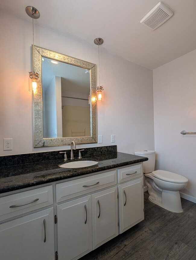 Building Photo - Updated 3-Bedroom, 2.5-Bath Home ~ Solid Surface Flooring and Spacious Kitchen!