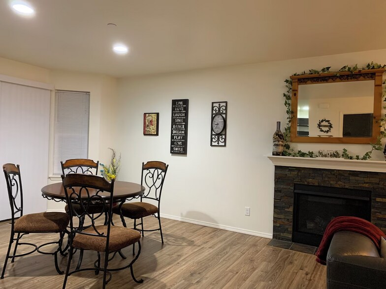 Dining with cozy fireplace - 1747 Vela Ln SW