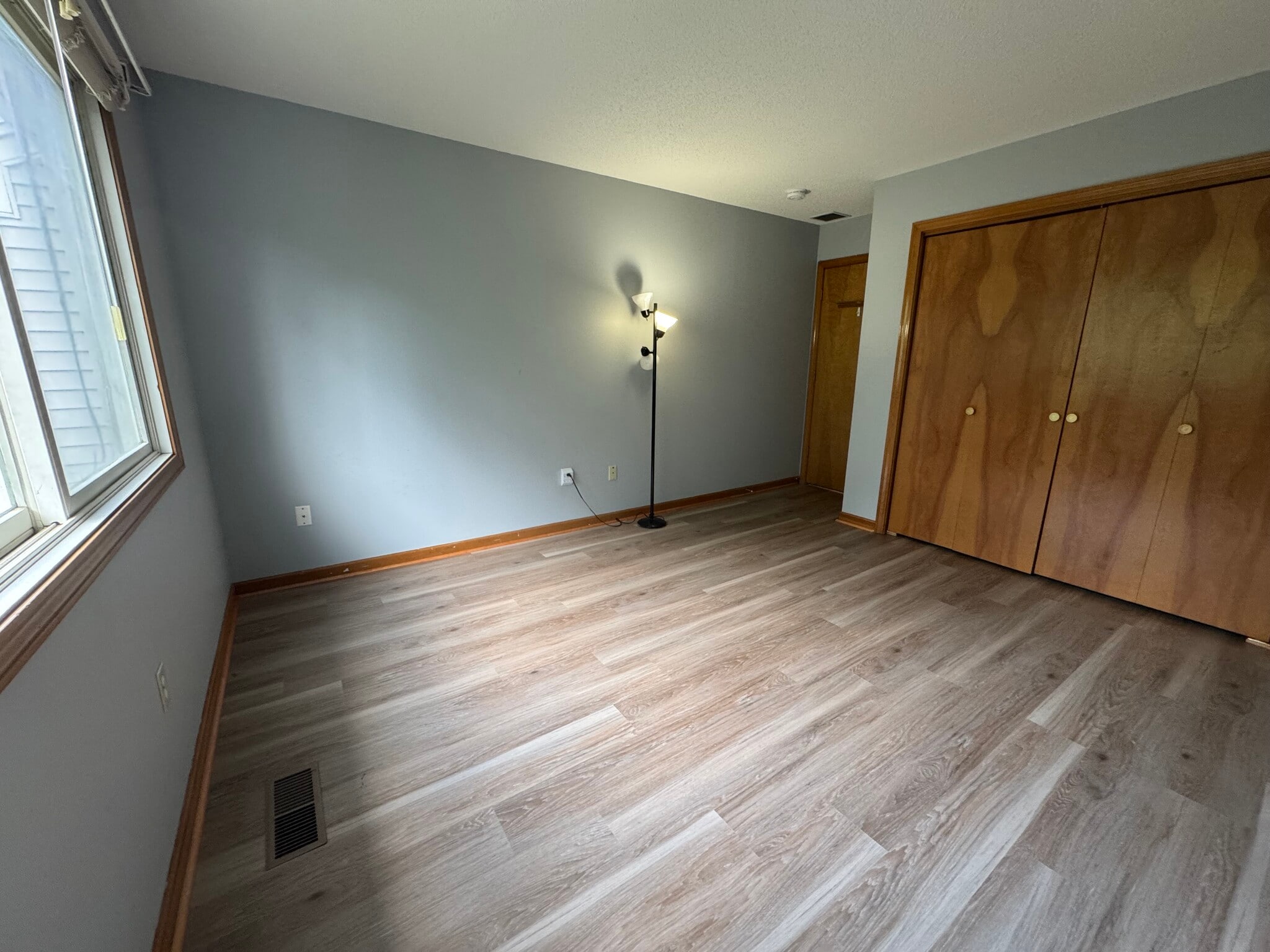 Large closet and large window brings in lots of natural light - 705 Lake Ave