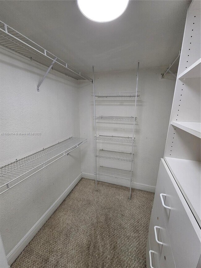 Building Photo - 10915 W Okeechobee Rd