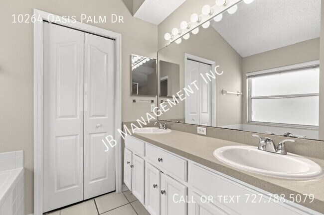 Building Photo - 10264 Oasis Palm Dr