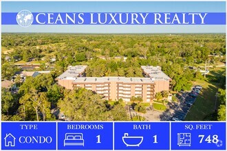 Building Photo - Spacious Condo with Tranquil Surroundings ...
