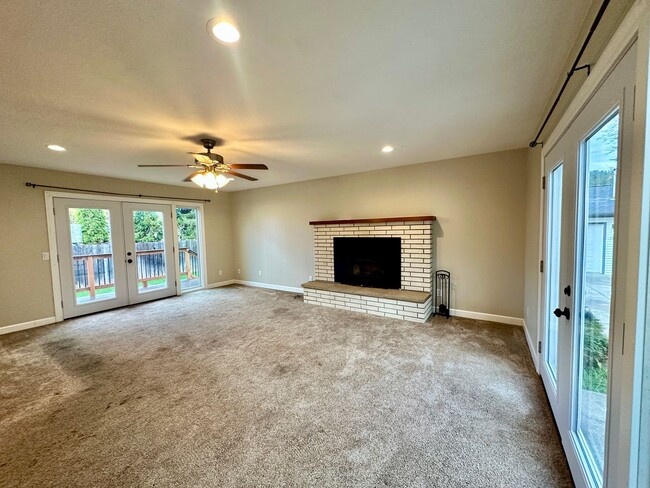 Building Photo - Stunning 2 level home with wood floors and...