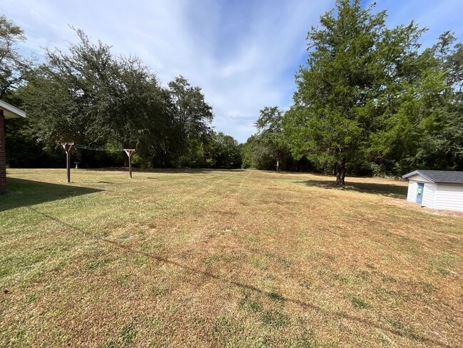 Building Photo - Country Setting on Paved Road