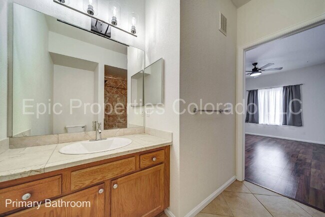 Building Photo - First Floor Corner 2 bed/2bath unit by Buckley SFB! Deeded Parking Right in Front!