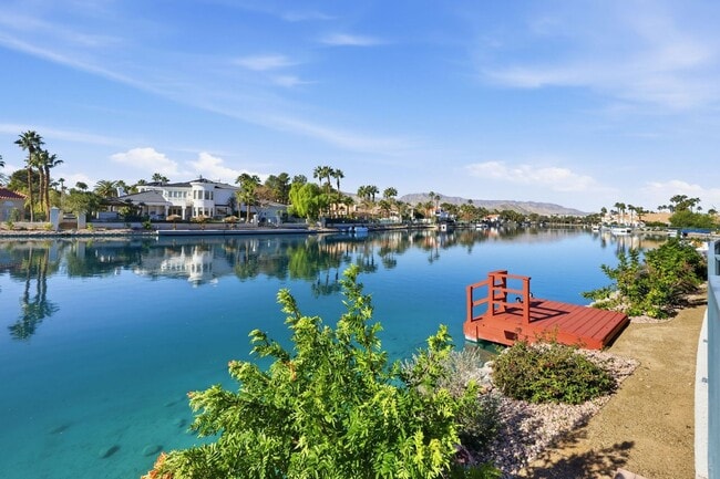 Building Photo - Luxury Lakefront Living in Desert Shores – 4 Bedroom Home with Private Dock & Stunning Views