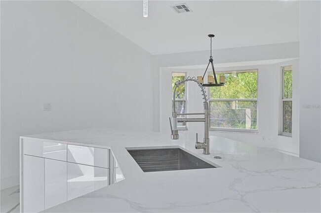 Building Photo - 3832 Sabal Springs Blvd