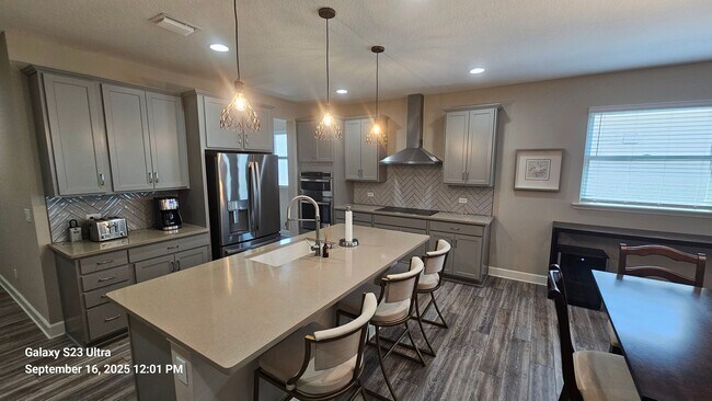 Building Photo - Beautifully Furnished Home in Upscale Gate...