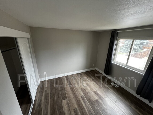 Building Photo - 8841 W Cooper Ave