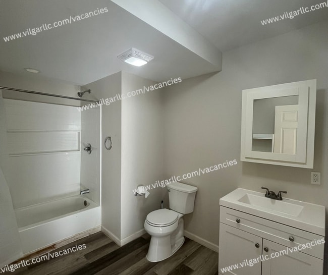 Building Photo - 3 Bedrooms • 1 Large Bathroom, Master suite is a spacious 2nd-floor loft-style bedroom with added...