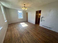 Building Photo - FOR RENT- Two Bed One Bath Downtown Apartm...