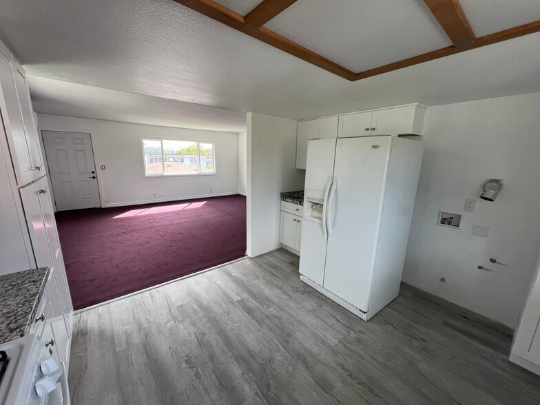 kitchen with refrigerator - 1210 Ballista Ave