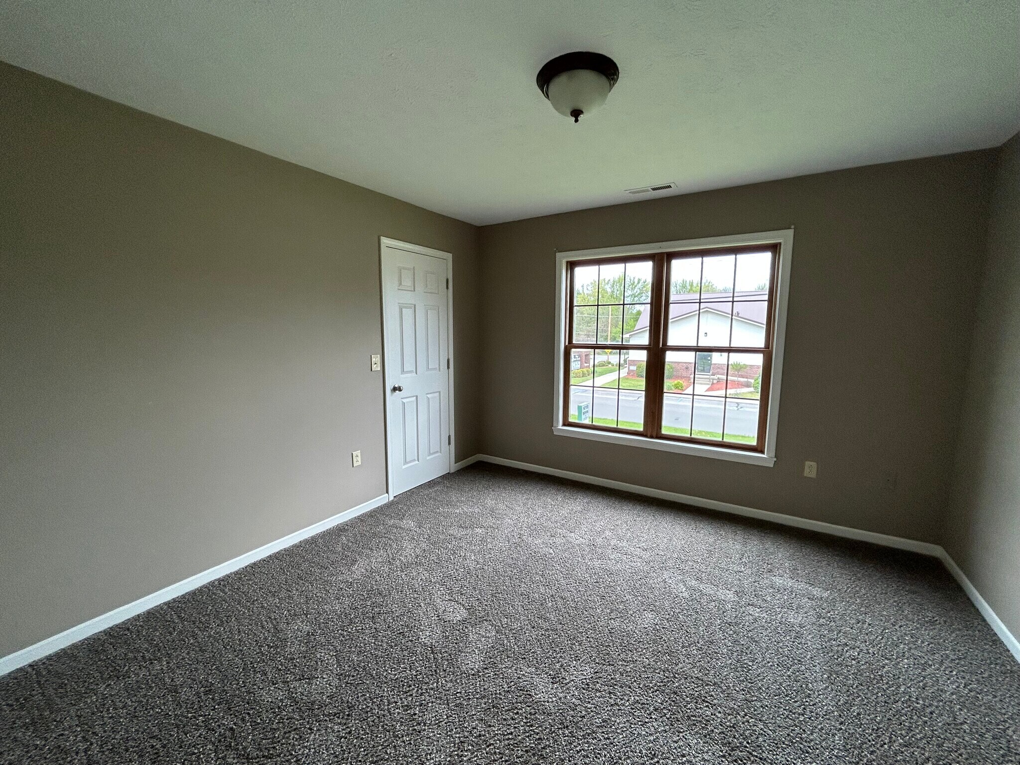 Main bedroom with access to full bathroom. - 114 N Third St
