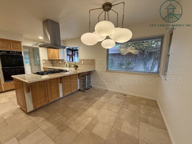 Building Photo - Beautifully Updated Three Bed (+ Bonus) Quail Lodge Home