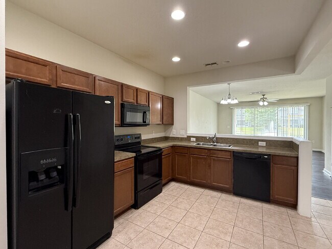 Building Photo - "Stunning Water View Townhouse for Rent in...