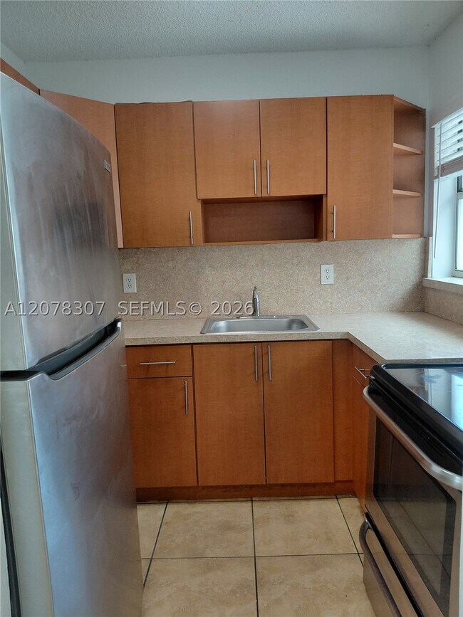 Building Photo - 5461 W 24th Ave