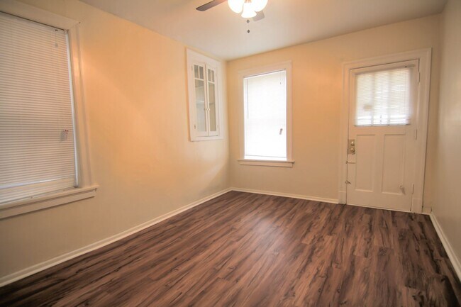 Building Photo - This 2 bedroom 1 bath home has been completely refinished with brilliant hardwood floors throughout!