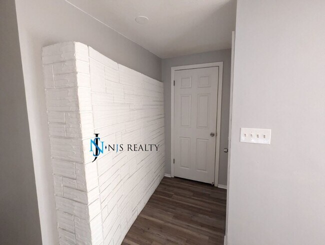 Building Photo - Just Reduced!  2/2/1 with  RENOVATED baths & kitchen, fenced yard, NEW lvp flooring and a OVERSIZ...