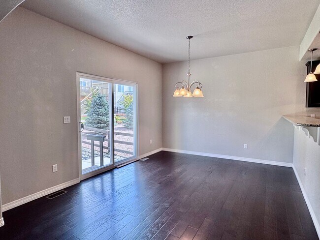 Building Photo - Beautifully Maintained Woodmoor Home Featu...