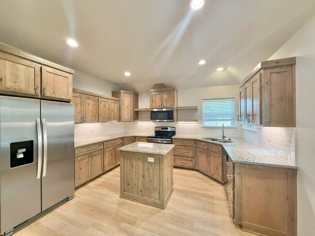 Building Photo - Tour Today: Charming 1-Story 4 Bedroom Home with Modern Comforts!