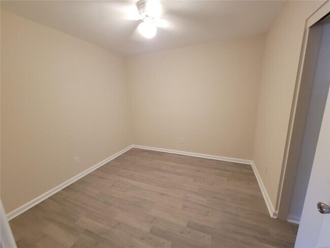 Building Photo - NEW Floors, Roof, Lights, Appliances, ect....