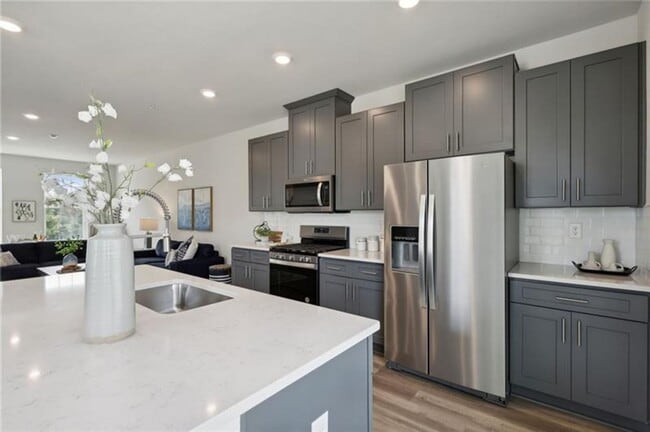 Building Photo - Luxury End-Unit Townhome with 4 Bedrooms &...