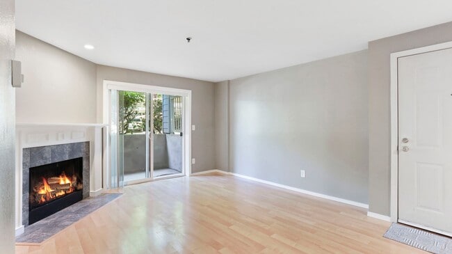 Building Photo - This ground floor corner-unit condo